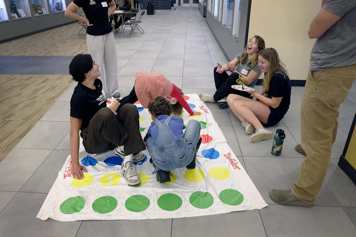 Student athletes volunteer their time in shifts to entertain youths, ages 3-14, on Dec. 6 for five hours at the fitness center during the twice-annual Parent’s Night Out. For nearly 15 years, the event has raised money for CC’s Student-Athlete Advisory Committee. Photo by Jamie Cotten / Colorado College