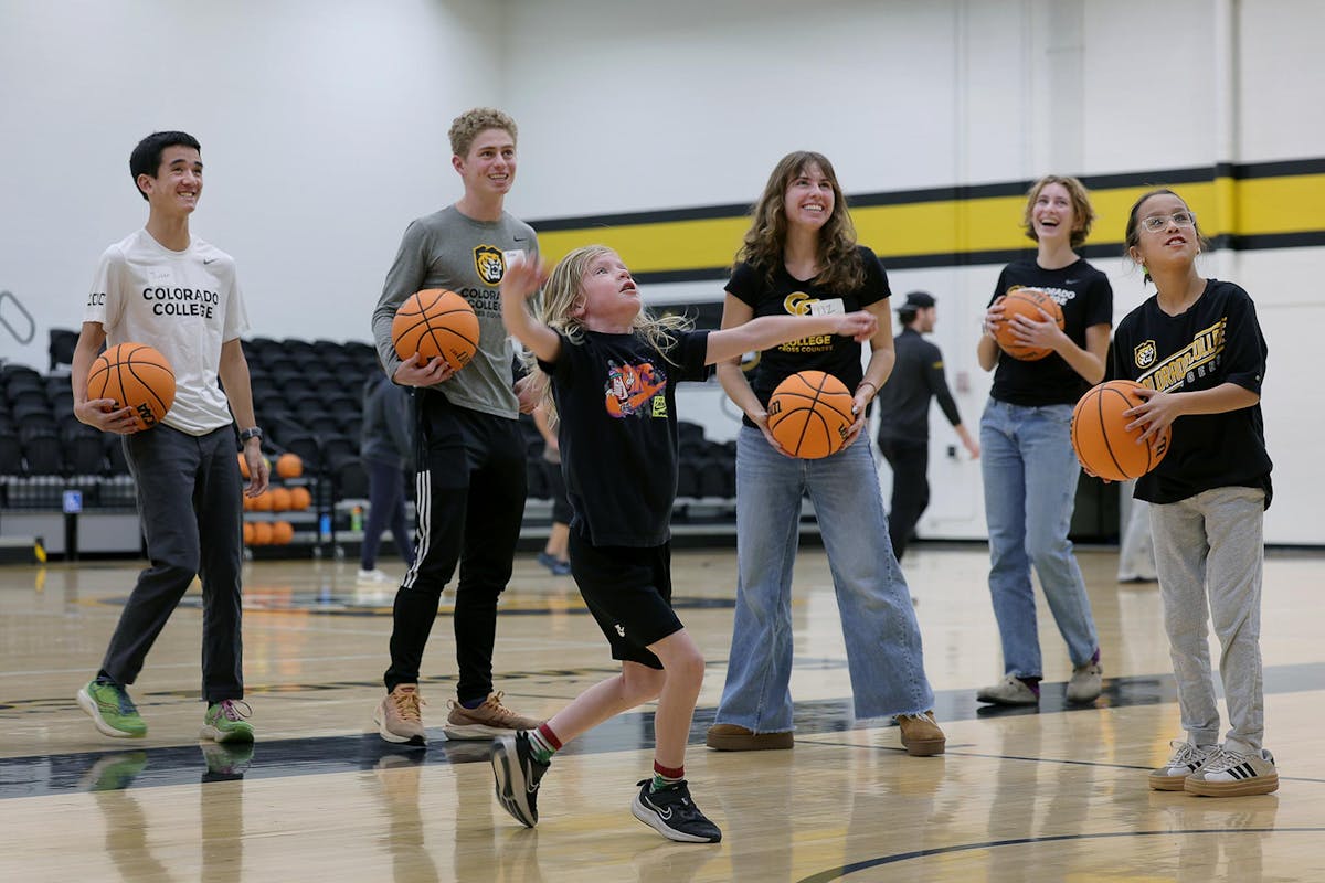 Student athletes volunteer their time in shifts to entertain youths, ages 3-14, on Dec. 6 for five hours at the fitness center during the twice-annual Parent’s Night Out. For nearly 15 years, the event has raised money for CC’s Student-Athlete Advisory Committee. Photo by Jamie Cotten / Colorado College
