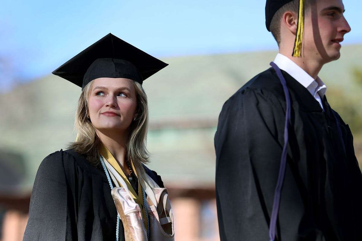 Natalie Logue '24, a sociology and dance major, waits to enter Shove Chapel on Dec. 15 to accept her diploma during Winter Commencement 2024. Photo by Jamie Cotten / Colorado College