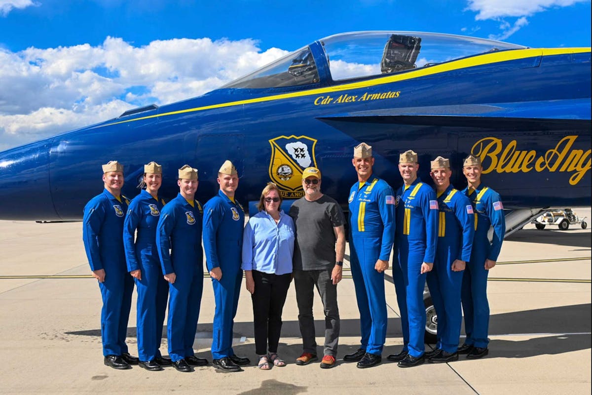 Captain Isaac Becker ’17 and other Blue Angels pilots with Professor Mike Taber ’86 and his wife, Kara Taber ’85 on August 16. Photo provided by Mike Taber.