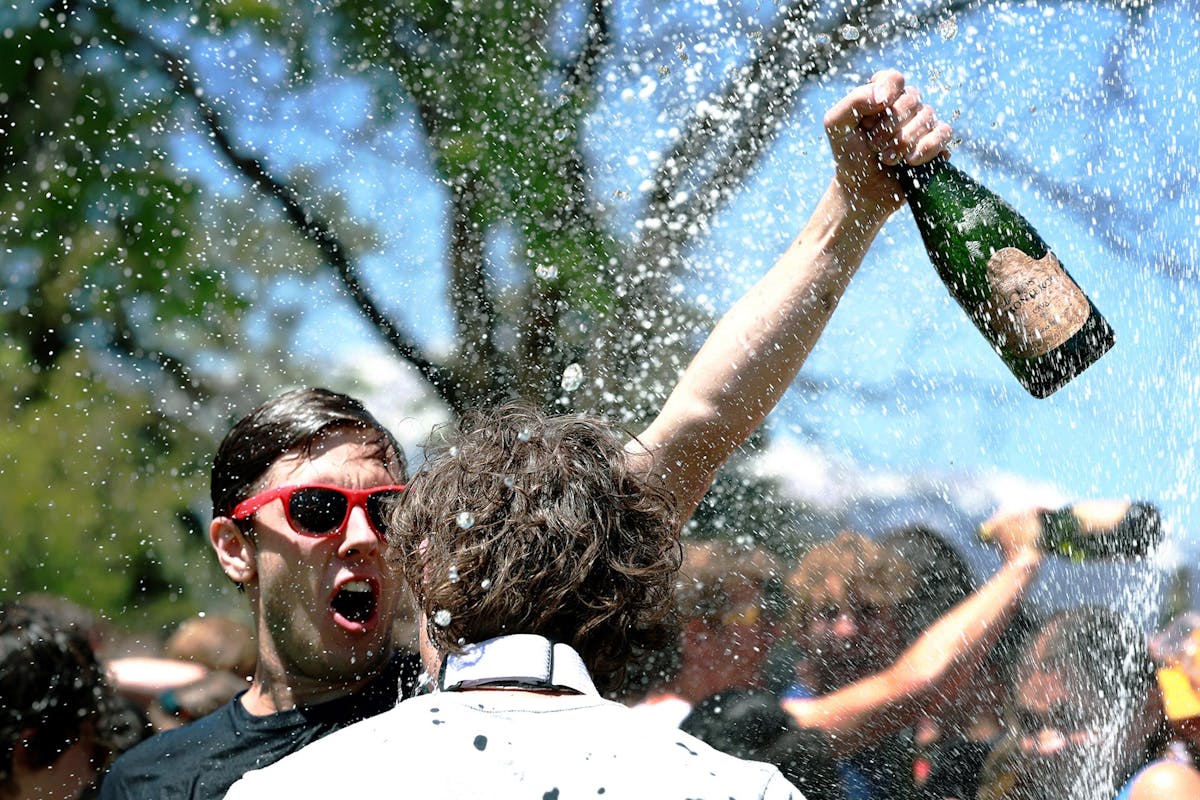Seniors gather for the annual Champagne Showers to celebrate the end of Block 8 and their time as students at CC on May 14 on Worner Quad. Photo by Jamie Cotten