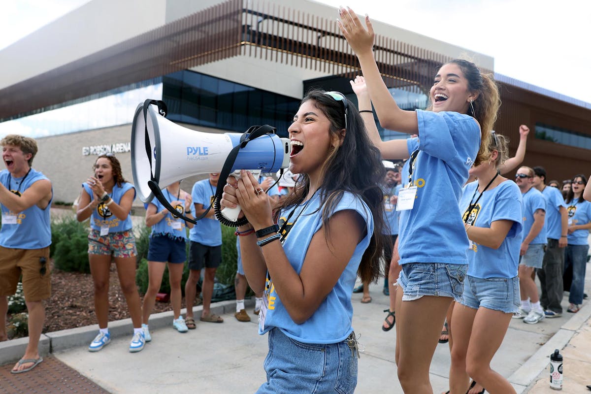 NSO kicks off with cheers, chants, and contagious energy as student leaders form a welcome tunnel for the incoming class outside Ed Robson Arena. Photo by Jamie Cotten