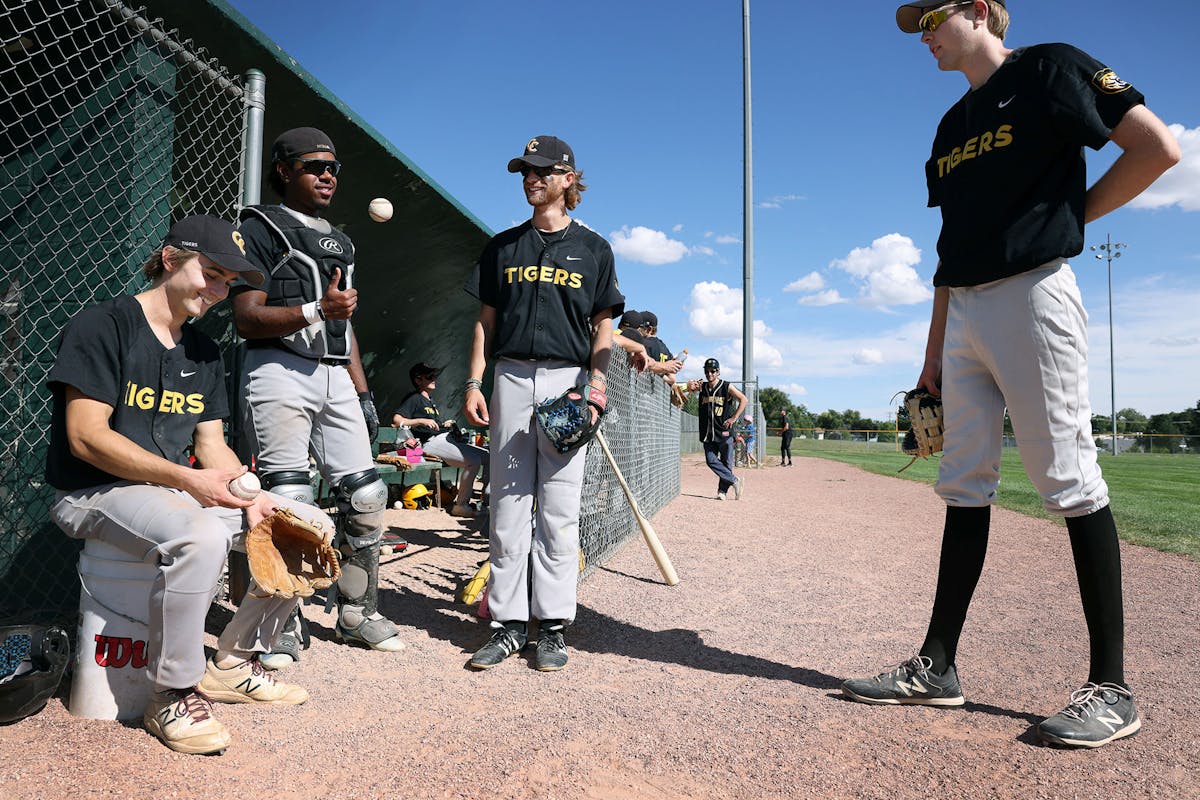 CC Club Baseball players wait for their first home game of the season to begin during Family Weekend. Photo by Jamie Cotten / Colorado College