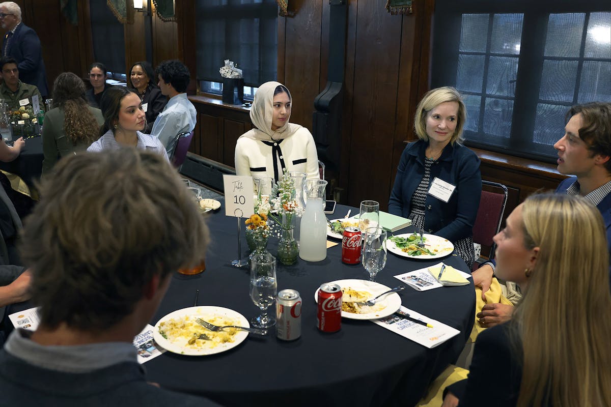 Lora Louise Broady, Visiting Executive in Residence in Economics & Business, center right, was one of a group of alumni, who led tables of students interested in careers in business during the Career Center's Business Careers Night on Oct. 21 in Bemis Great Hall. Photo by Jamie Cotten / Colorado College